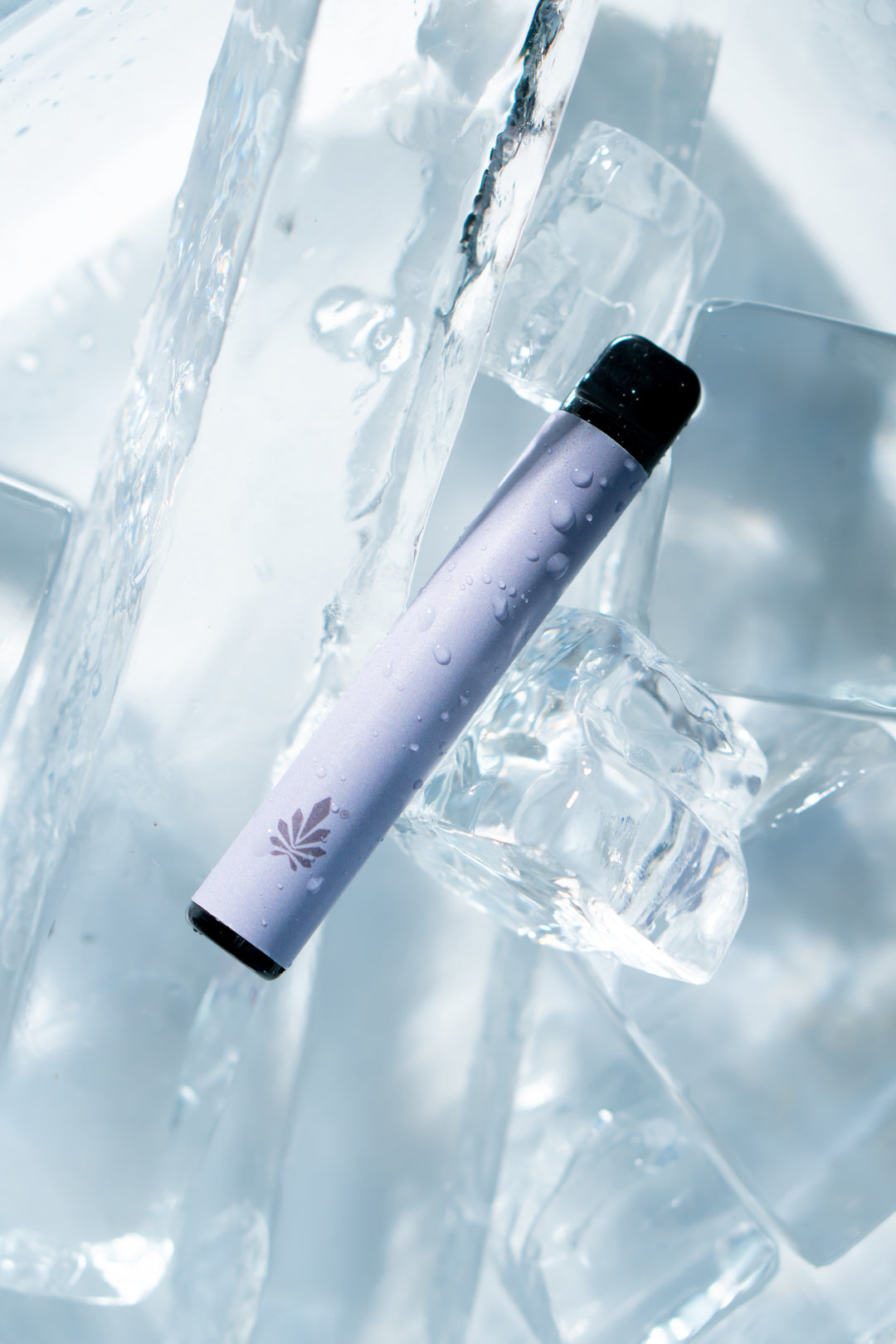 a premium vape displayed on an artistic setting, on ice blocks