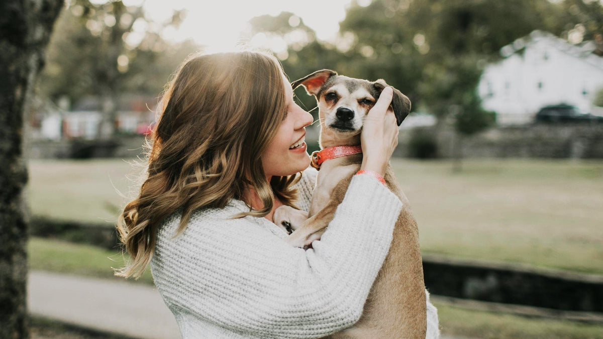Nine Realms Customer With Her Dog