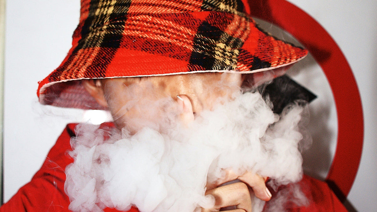 Man Vaping Nine Realms HHC Premium Vape