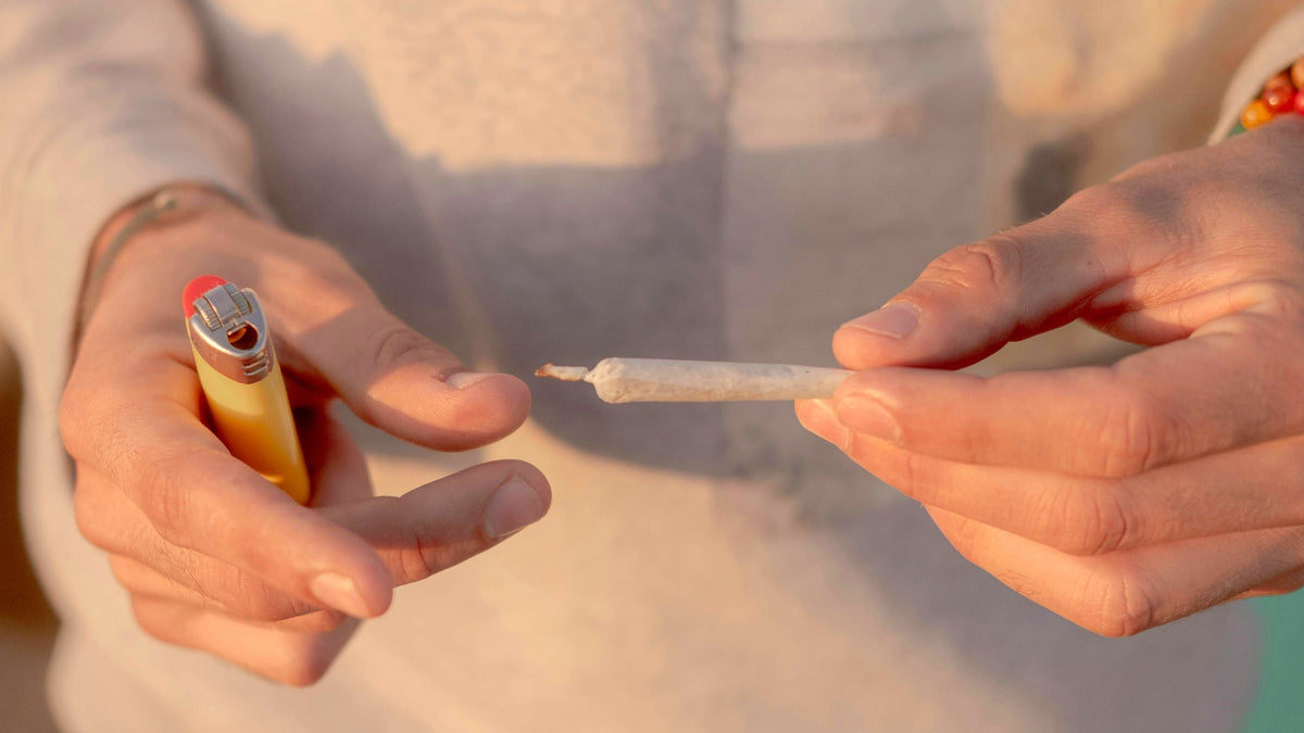 Man Holding a Nine Realms HHC Joint