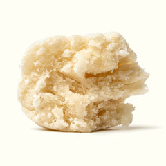 Nine Realms PRO Piatella Hash close-up: pale, creamy, flaky Piatella piece on a cream background