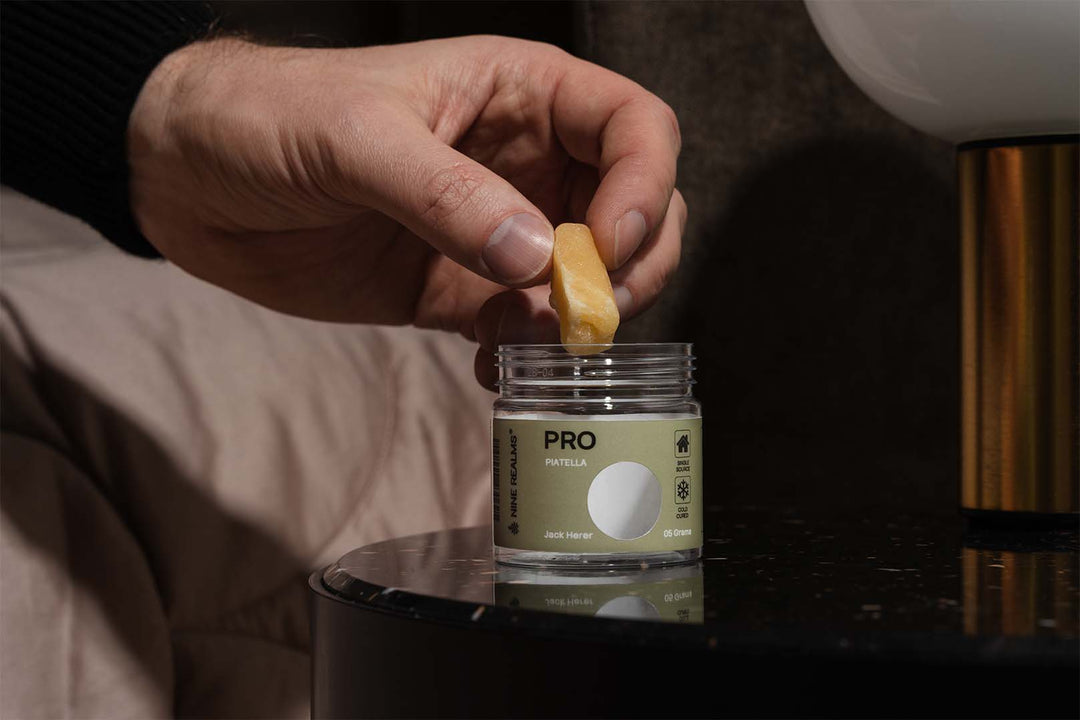 Piatella Hash T9HC From Nine Realms on a dark marble table